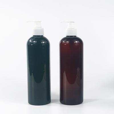 China BEAUTY PACKAGING Round Bottles With Smooth Black Top Caps PET Bottles With Lotion Pump 500ml Shampoo Bottle for sale