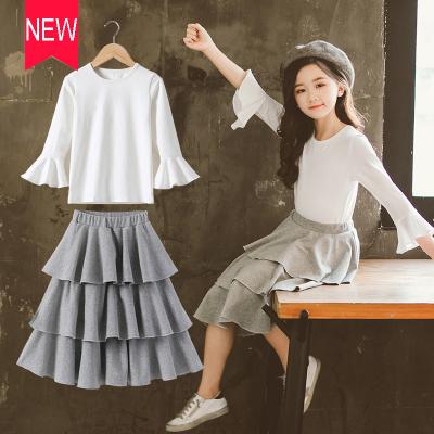 China Casual Girls Trumpet Collar O Shirt White Shirt Skirt And Diaper Cake 2 Piece Fashion Autumn Kid Girl Dress Sets for sale