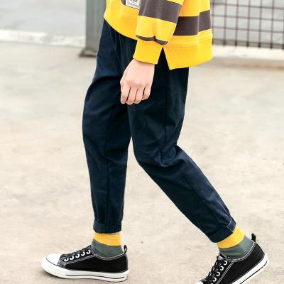 China 2021 breathable Korean fashion black version of pure color design young boys girl pants 6-14 years old new for sale