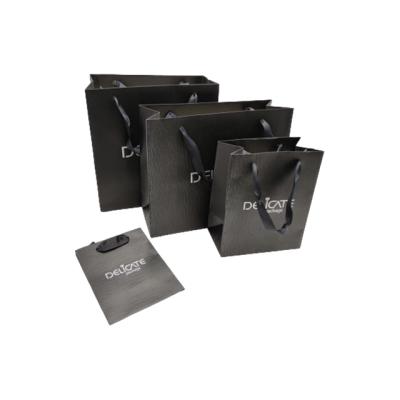 China Wholesale Recyclable Luxury Black Shoes Clothes Kraft Paper Bags Printed Custom Logo Packaging Paper Bag Clothing Shopping Gift Jewelry for sale