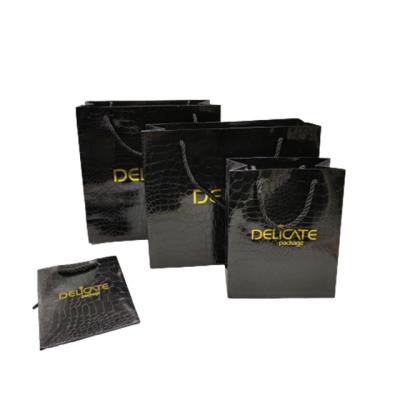 China Luxury famous manufacturer brand jewelry gift shopping recyclable packaging small black paper bags custom printing with your own logo for sale