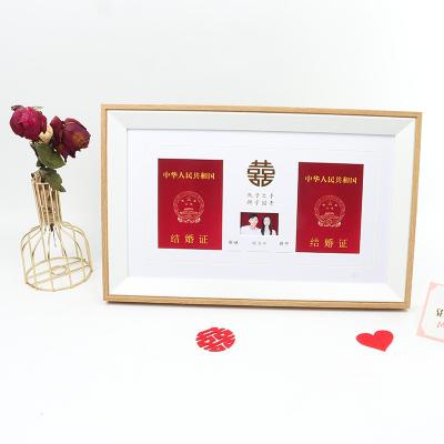 China Environmentally Friendly Wholesale Tiktok Certificate Photo Series Chinese Wedding Frame The Same Double Style Studio Couples Happiness Photo Frame for sale