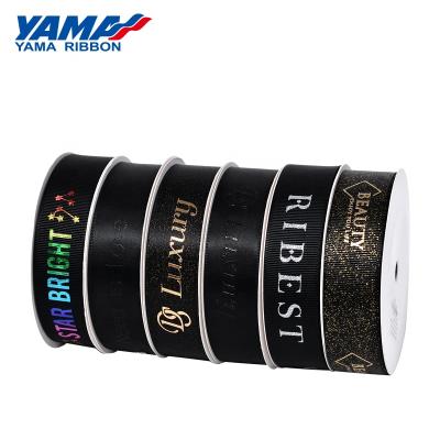 China High Tenacity Yama Printed Ribbon Suppliers 9/16/25/38MM Wide Black Satin Custom Wrap Silk Ribbon for sale