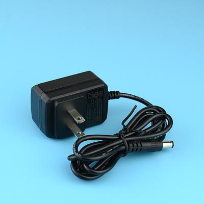 China US AC DC Switching AC DC Power Adapter 5V 1A 2A 2.5A 12V 0.25A 1.25A For Table Lamp for sale