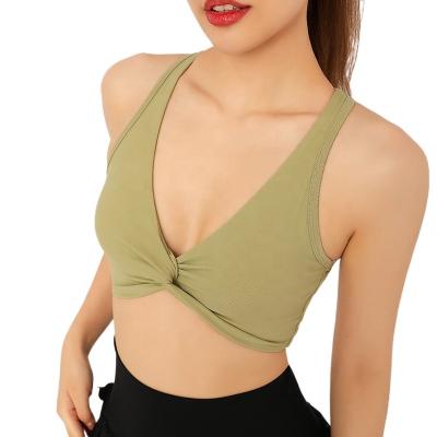 China Wholesale New Breathable Green Solid Color Sports Yoga Women Seamless Adjustable Deep V Sexy Bra for sale