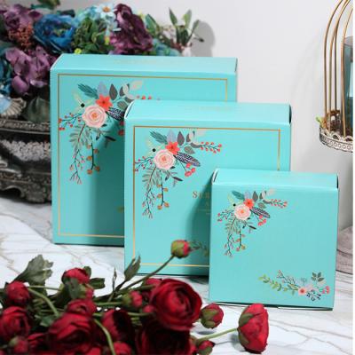 China Recyclable Packaging Gift Box Manufacturers Creative Festive Perfume Cosmetic Packaging Gift Box With Ribbon for sale