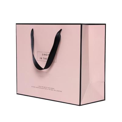 China Recyclable Fancy Design Gift Bags Cheap Shopping Bag Paper Packaging Bags Wholesale for sale