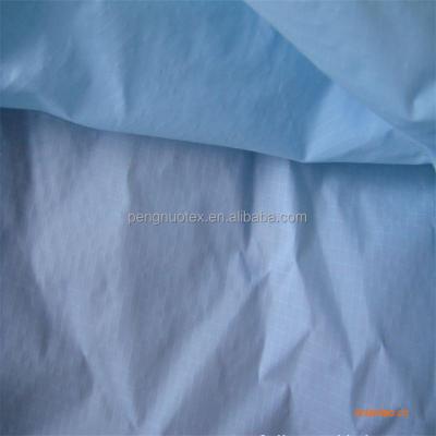 China Downproof 100% Nylon Taffeta 210t Ripstop Nylon Taffeta 0.3cm*0.3cm Fabric For Parka Jacket for sale