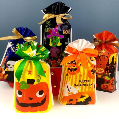 China Hot Selling 50 Pcs Fashion Halloween Candy Gift Bags Plastic Drawstring Gift Bags For Kids Pumpkin Bats Gift Envelope Bags for sale