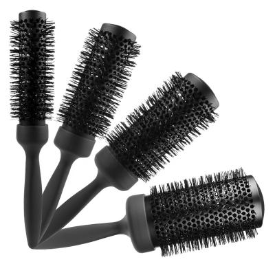 China Professional Cushion and Blow Hole Honeycomb Design Temperature Resistance ABS Nylon Around Ceramic Thermal Hair Brush for sale