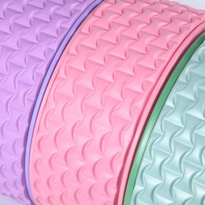 China Multicolor Optional Modern Round 3D Fitness Back Training Wheel Bare Back Yoga Roller for sale