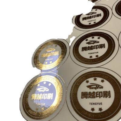 China Waterproof Gold Foil Sticker Clear Gold Foil Sticker Hot Stamping Gold Foil Stickers Custom for sale