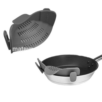 China Sustainable fits all pots and bowls snap 'n tension clip on silicone strainer for sale