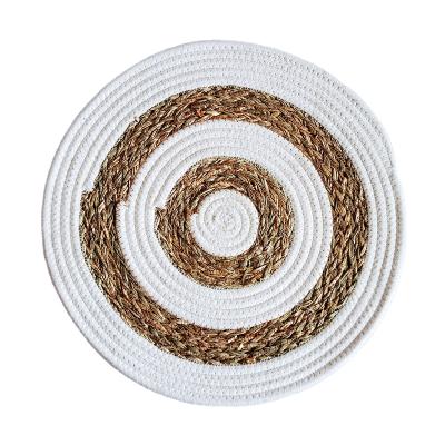 China Sustainable Round Woven Natural Place Mats Water Hyacinth And Cotton Rope Braided Place Mats For Dining Table Heat Resistant Thick Rattan for sale