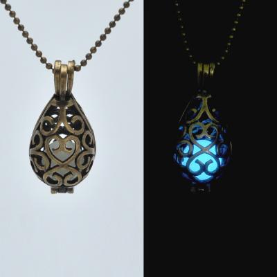 China European Brass Hollow Water Drop Atlantis Silver Glow In Dark Pendant Pierced Statement Chocker Luminous Pendant Necklace For Women for sale