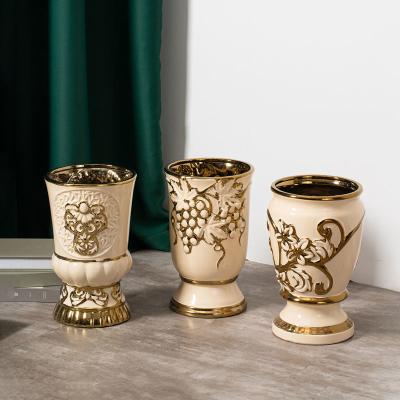 China Gold tabletop ceramic decoration wedding centerpiece porcelain vase embossed luxury ceramic flower vases for home decor for sale