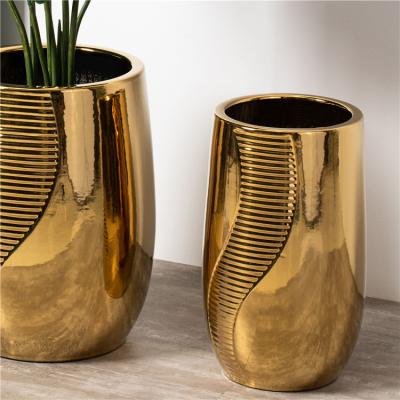 China Hotel home floor vertical decor large big electroplate golden ceramic flower pots planter pots for sale