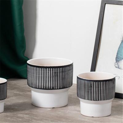 China Fashionable design modern style simple elegant planter flower pot outdoor decoration cheap embossed ceramic plant pots for sale