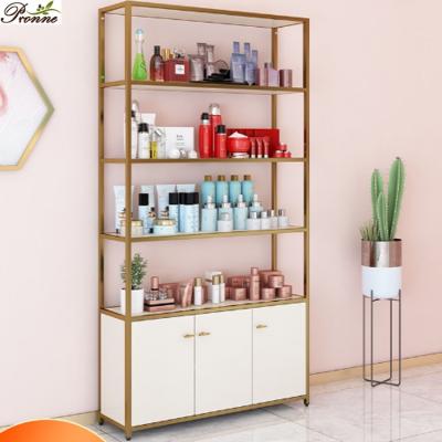 China Gold Simple and Modern Luxurious Metal Store Nail Salon Beauty Pronne Cosmetic Display Cabinet for sale