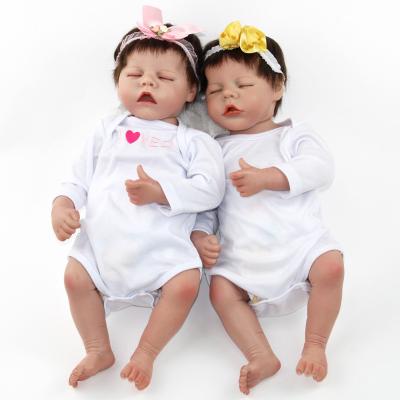 China Widely used top lifelike vinyl 18inch changeable clothing quality reborn doll with real body twins for sale