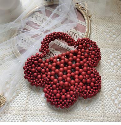 China Luxury Pearl Bag Fashion Designer Acrylic Beaded Purse Women Party Hollow Woven Handbag for sale