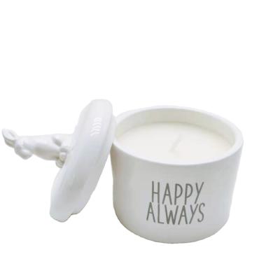 China Custom Unique Ceramic Scented Bunny Shape Lid Handle White Cup Candle Jars Candle for sale