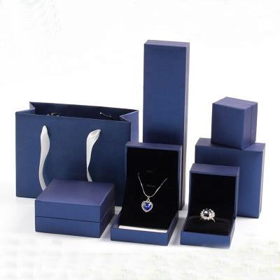 China Wholesale Custom Jewelry Packaging Gift Box Ring Bracelet Necklace Set Blue Stain Jewelry Packaging and Paper Plastic Box for sale