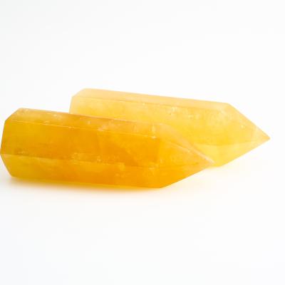 China Europe Wholesale Polished Crystal Point Tower Natural Yellow Calcite Quartz Crystal Wand for sale