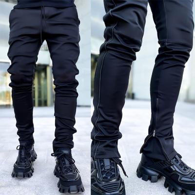 China Anti-wrinkle Men Plus Size Pocket Autumn GYM Pants Fashion Design Cargo Sports Reflective Jogger Pants for sale