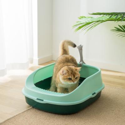 China Sustainable New Type Cat Litter Basin Semi Closed Splash Proof Cat Toilet Kitten Poop Basin Small Size Cat Litter Push Up for sale