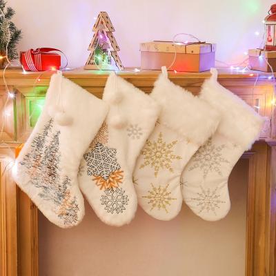 China DIY Accessories New Christmas Decorations Christmas Plush Storing Christmas Sock Wholesale White Drawstring Santa Sacks for sale