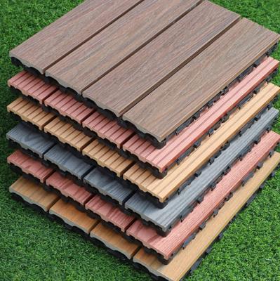 China DIY Waterproof Co-extrusion WPC Wood Decking Interlocking Waterproof Exterior Composite Floor Tile for sale