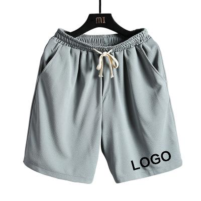 China OEM QUICK DRY custom logo ice silk shorts men plus size mens summer elastic shorts loose casual mens Capris shorts for sale