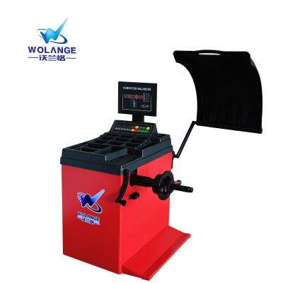 China Impact Testing Machine High Performance Wolange W-50B Car Tire Wheel Balancer Smart Balancing Machine Automatic W-50B for sale