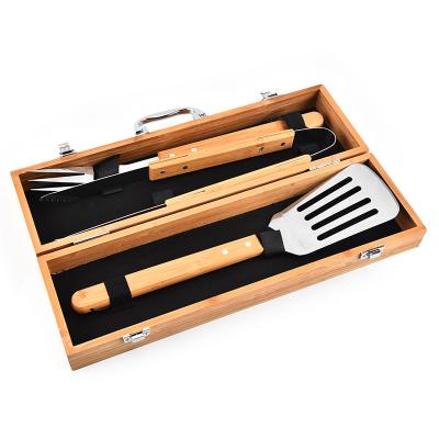 China Hot Selling Easily Cleaned 3 Pieces BBQ Grilling Accessories Handle Bamboo BBQ Tool Kit With Suitcase Bamboo Box for sale