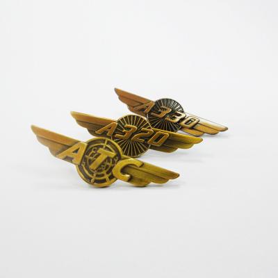 China Wholesale Cheap Custom Europe Metal Crafts Enamel Custom Lapel Pins Wings Pin Badge for sale