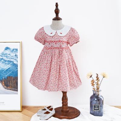 China Breathable Ready To Ship Baby Kids Girls Floral Dresses Boutique Short Sleeve Smocked Dresses for sale