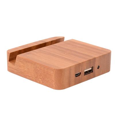 China 2020 New Trendy Wooden Phone Stand Power Bank Product Eco Power Banks 5200mAh With Phone Stand Function for sale