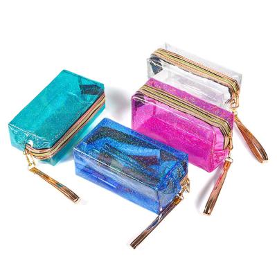 China Reflective Luxury Transparent Cosmetic Pouch Luxury ROSE Color Laser Travel Zipper Travel Zipper Holographic Makeup Bag for sale