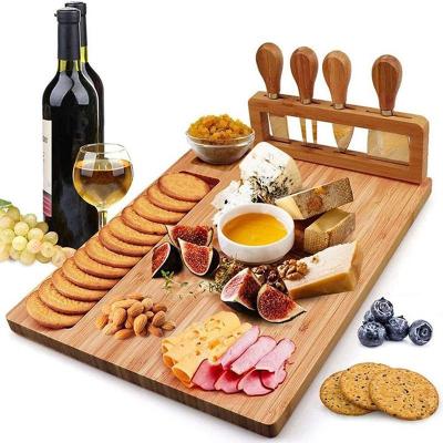 China Custom Black Walnut Wood Bulk Bamboo Chopping Block Kitchen Cheese Cutting Board With Tools for sale