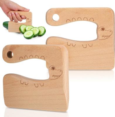 Chine OEM couteau en bois pour enfants pour cuisiner poisson mignon en forme de dinosaure jouet de cuisine coupe-végétaux à vendre