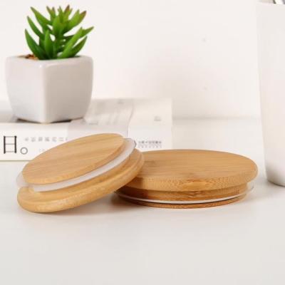 China Customized Natural Color Decorative Bamboo Lids for High Borosilicate Glass Mug Jars for sale