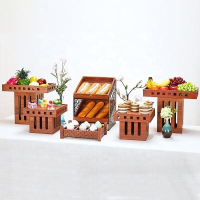 China Sapele Wood Buffet Catering Food Bread Display Rack Wooden Cake Dessert Sushi Display Stand for sale