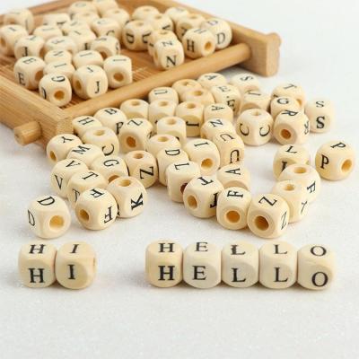 China 10mm 12mm Wooden Alphabet Beads Perfect for DIY Baby Education and Personalized Gifts for sale