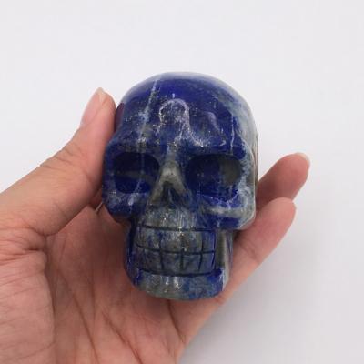 China Europe & American Natural Semi Precious Ore Stone Hand Carved Realistic Lazulite Crystal Skulls Carving for sale