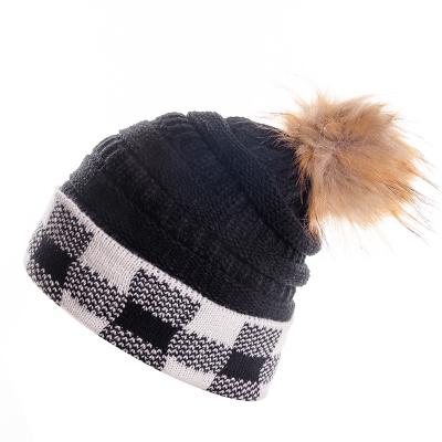 China COMMON Fall Winter Chunky Stretchy Cable Knit Beanie Fashionable Pom Pom Beanie Hat for sale