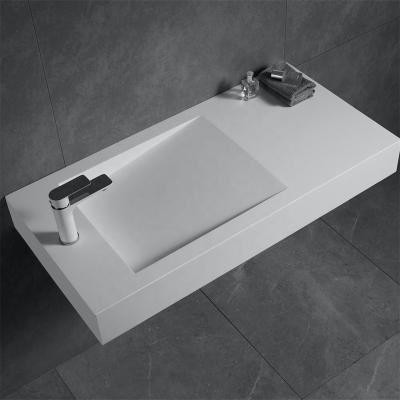 China Modern Bathroom Designs Modern Artificial Stone Solid Surface Sink Hanging Basin for sale