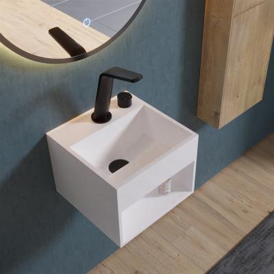 China Modern Wall Mounted Bathroom Small Size Stone Hand Wash Basin With Towel Stone Hanging Resin Wall-Hung Wash Basin for sale