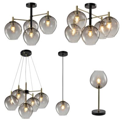 China HUAYI Contemporary Hot Selling Nordic Gold Glass Hanging Light Indoor Home Hotel Modern Decorative Pendant Light LED for sale