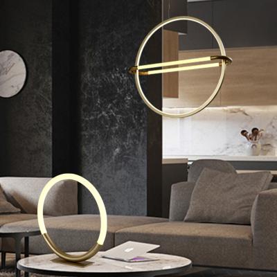 China HUAYI Newest Arrival Modern Style Ring 8W 10W Western Postmodern Indoor Living Room Bar Home Use LED Desk Table Lamp for sale